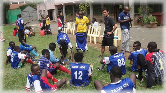 Football Coach from Oure Academy teaching at the Sadii Oval Sports Centre in Nairobi