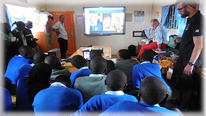 The Danish teachers on a visit to Raila educational Centre and here they are facilitating a Skype session between Kenyan students and Danish students